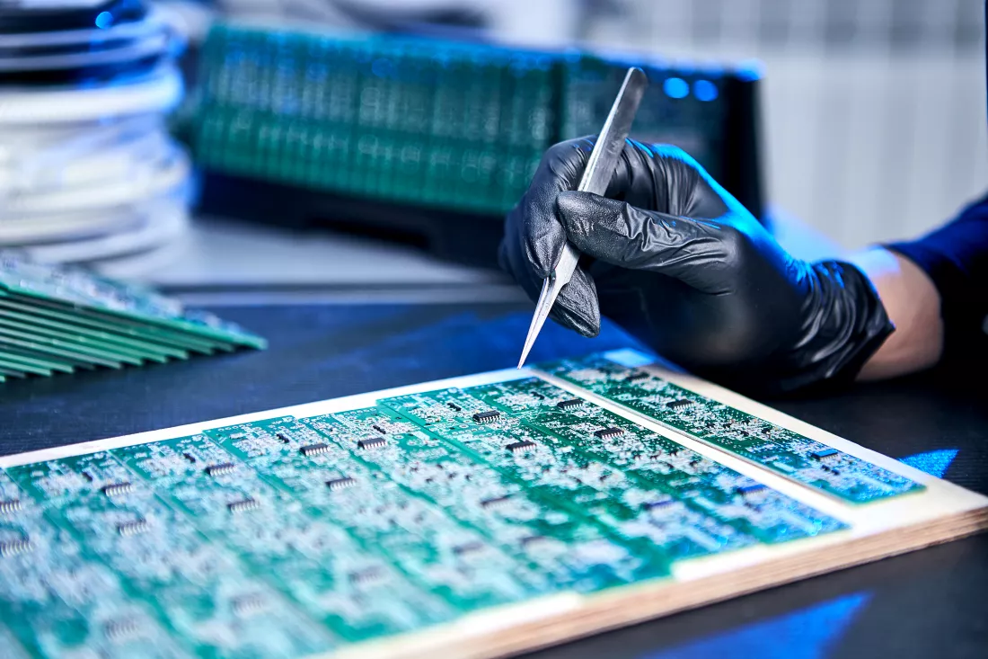 engineer-factory-worker-electronics-works-with-chip-board-microchip-production-nano-computer-technology-manufacturing-technological-process