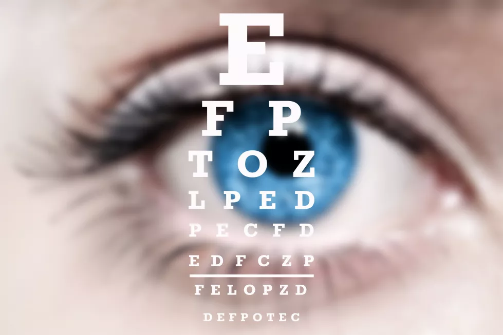snellen-table-checking-vision-against-background-eye
