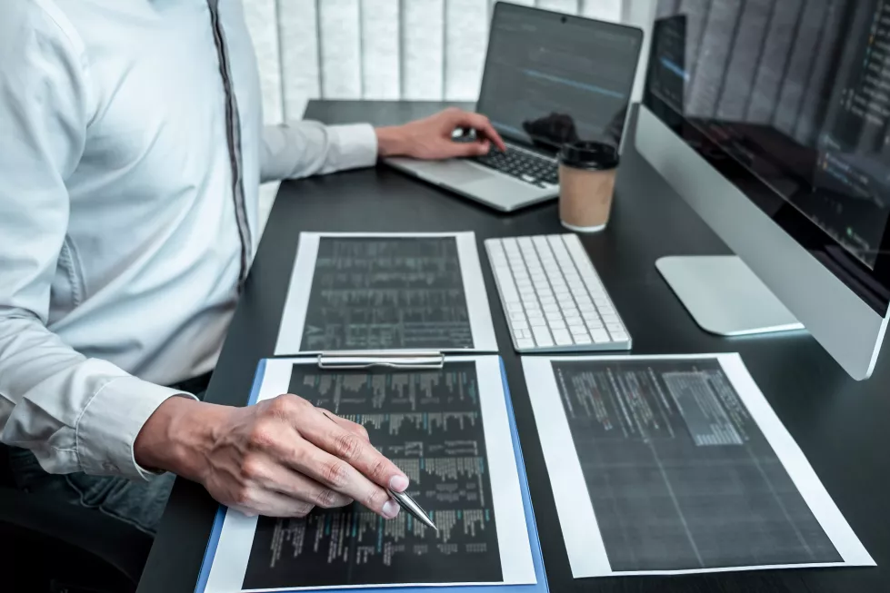 midsection-man-using-mobile-phone