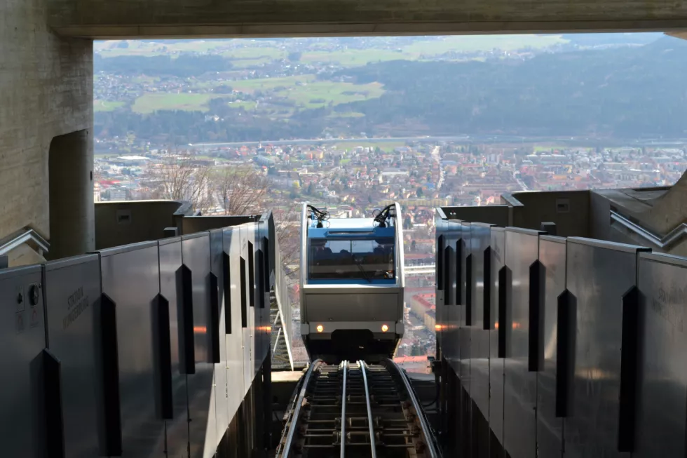view-funicular-climbing-up-escalator-with-alps-background