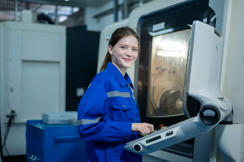 female-robotics-engineers-using-controller-remotely-operate-programming(1)