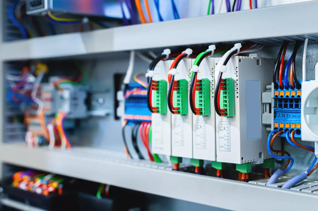 several-batch-switches-electrical-control-cabinet-production-line-surrounded-by-inverters