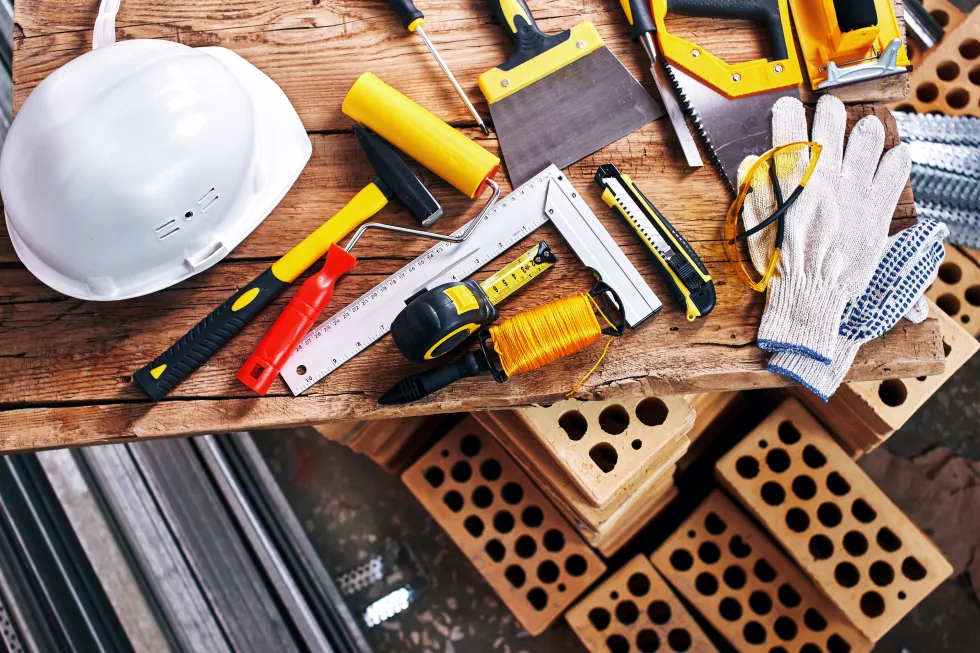 home-repairs-construction-tools-bricks-helmet-top-view