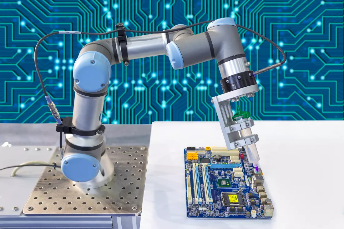 industrial-robot-installing-computer-chip