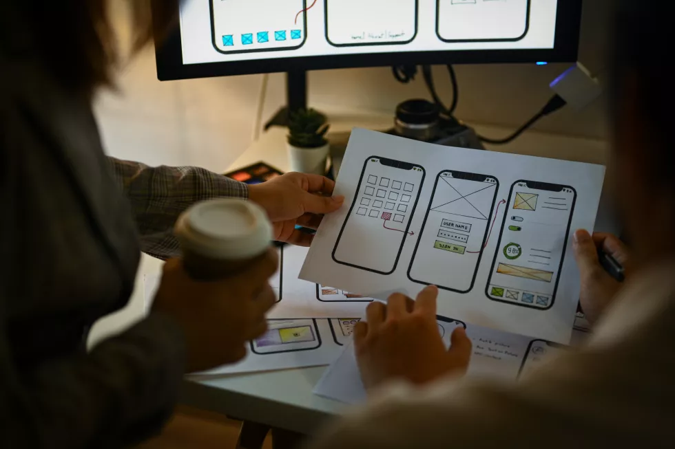 creative-designer-team-working-with-template-layout-framework-mobile-phone-application