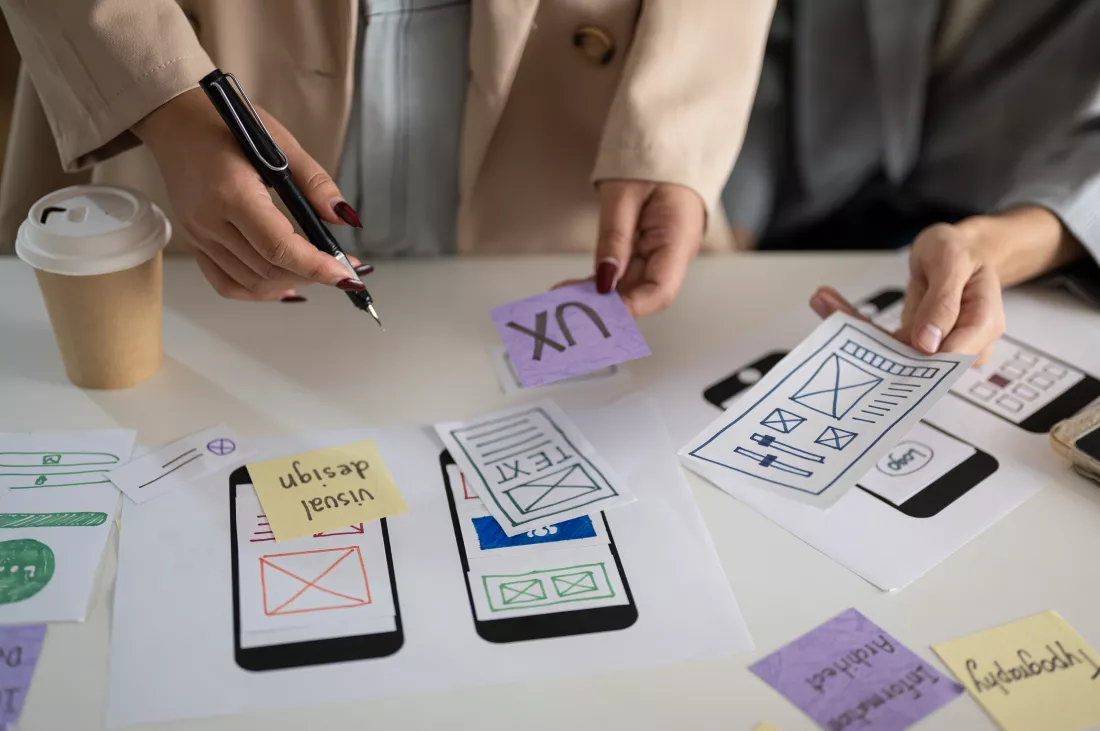 cropped-shot-group-ux-ui-graphic-designers-working-meeting