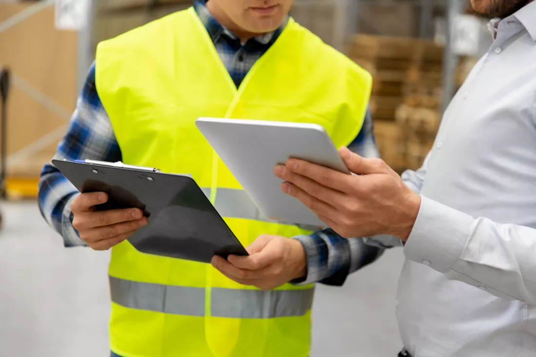 worker-businessman-with-tablet-pc-warehouse