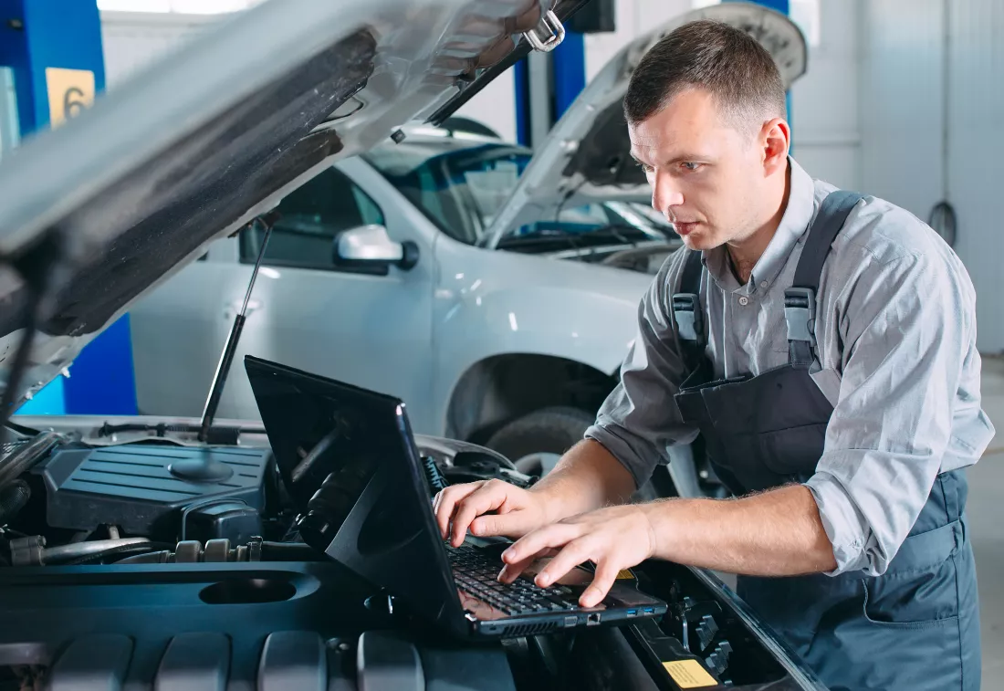 handsome-mechanic-uniform-working-auto-service