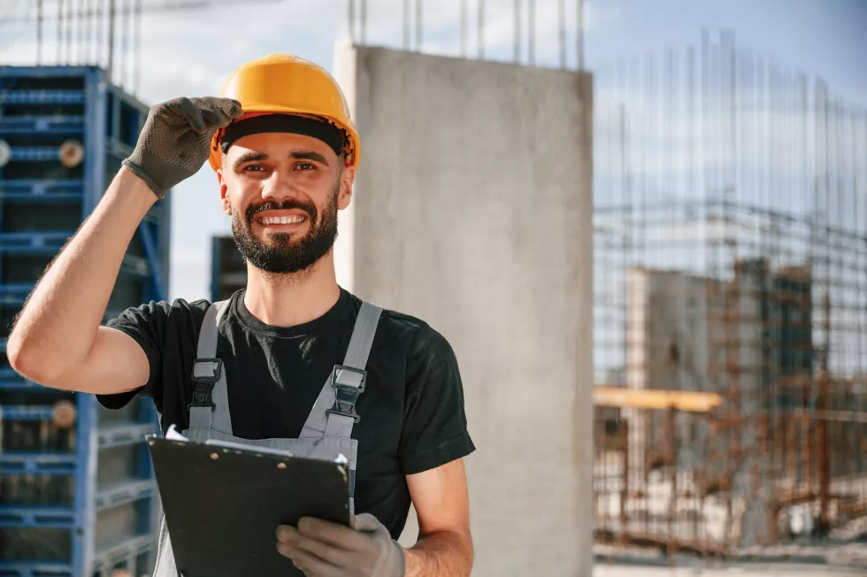 beautiful-portrait-man-uniform-is-working-construction-site