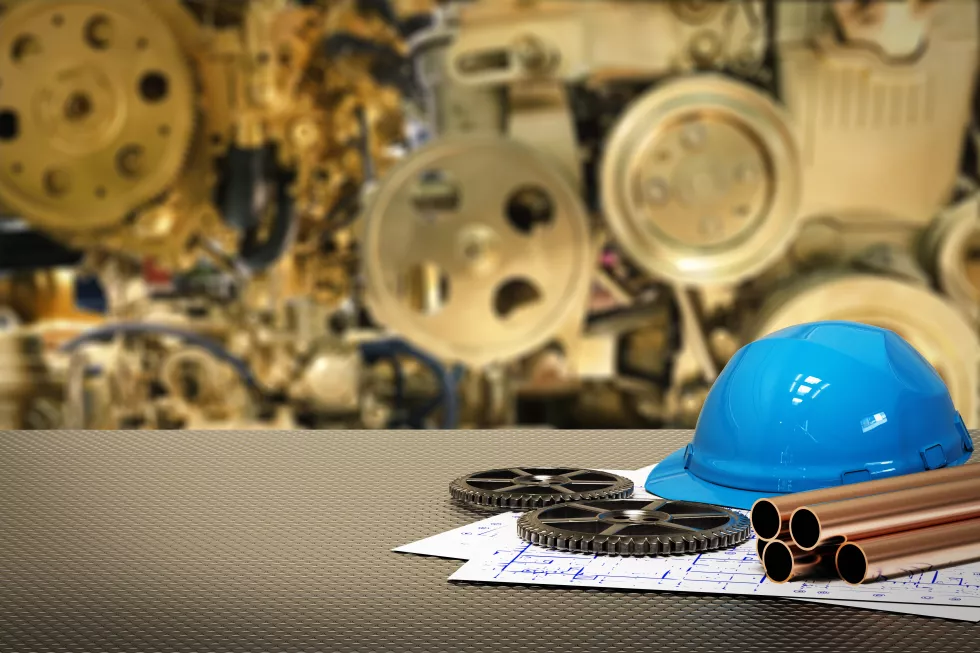 civil-engineer-concept-with-golden-gear-blurred-background