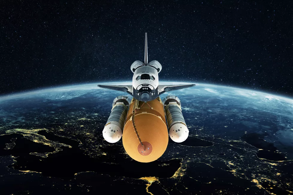 space-shuttle-flies-night-planet-earth-with-city-lights-space-with-stars-successful-launch-rocket-into-space-space-mission-concept-spaceship-lift-off-flying