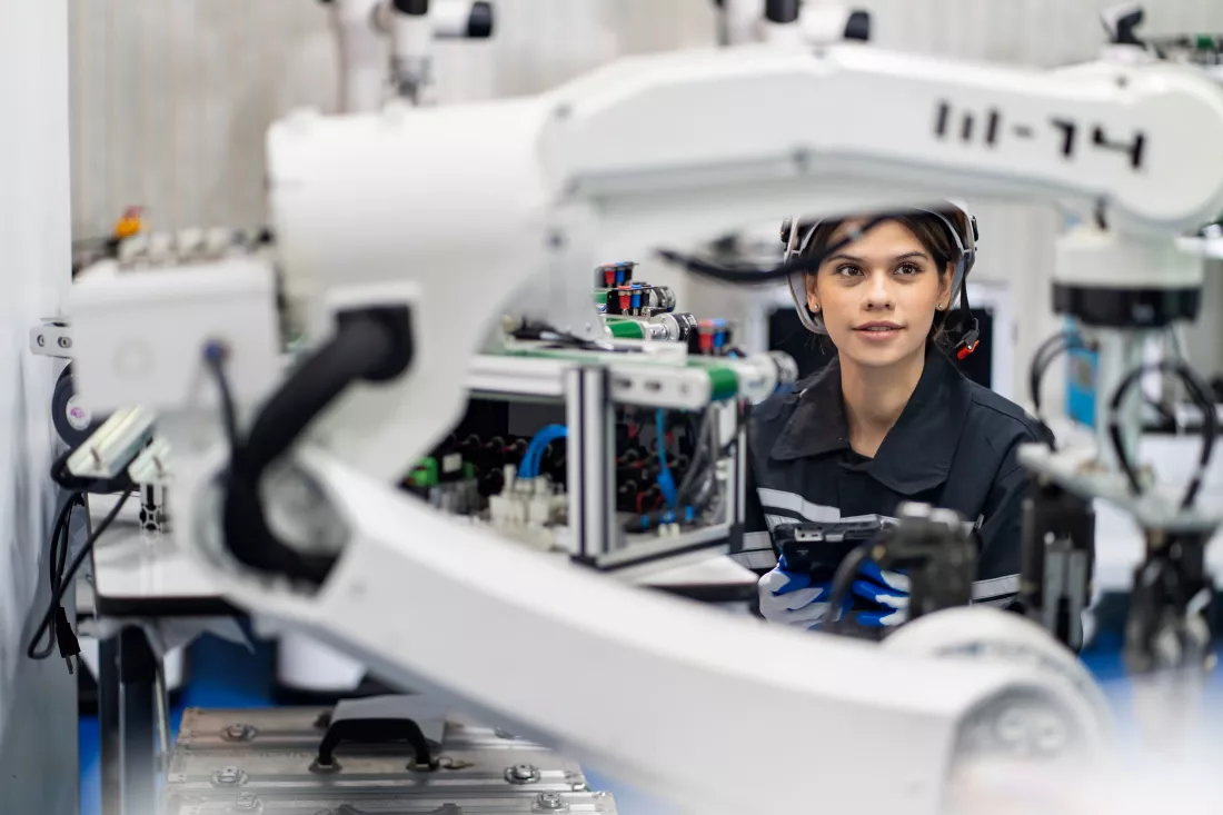 female-engineer-check-control-automation-robot-arms-machine-intelligent-factory-industrial-real-time-monitoring-system-software-robotics-digital-manufacturing-operation