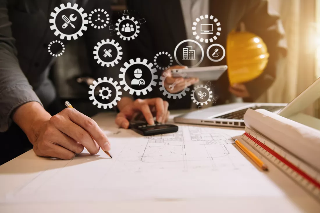 midsection-man-working-with-smart-phone-table