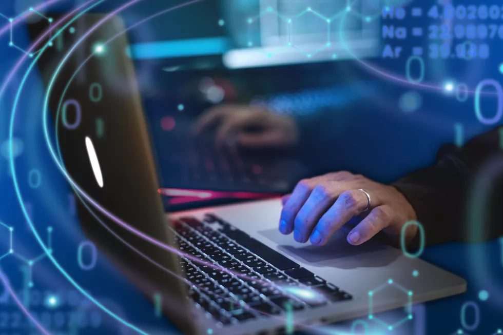 man-working-laptop-dark